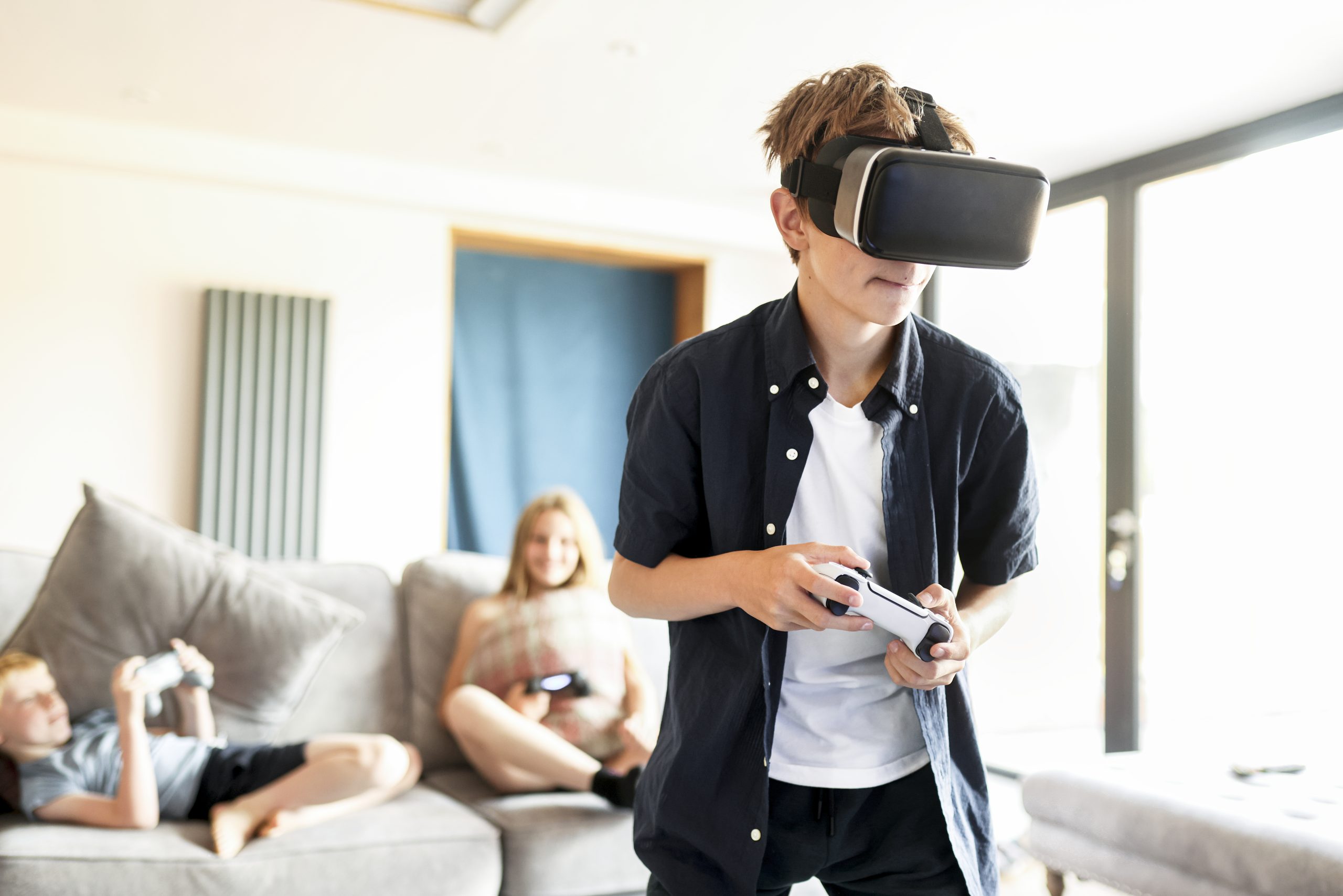 young-boy-playing-vr-game-at-home